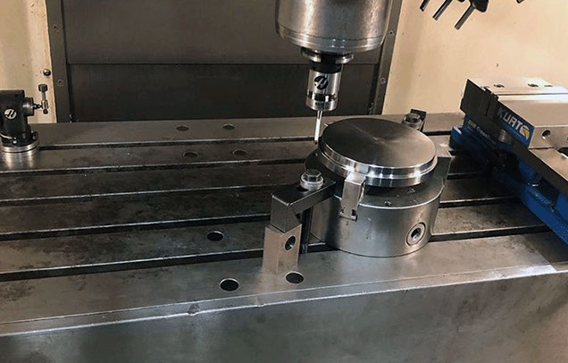 Haas VF4 Milling Valve A Haas VF4 mill at work just starting to cut a compressor valve