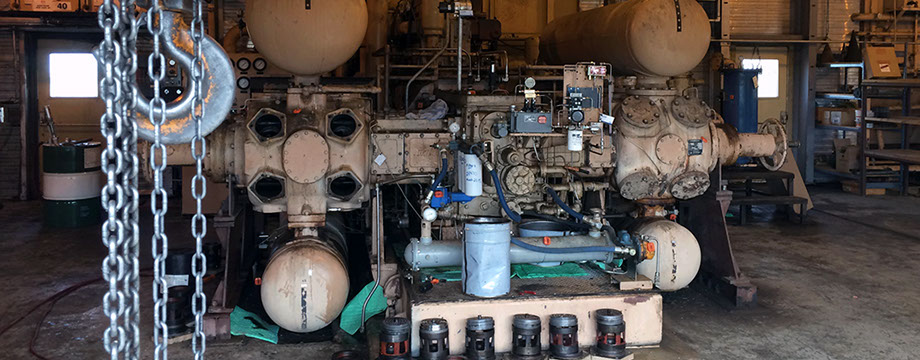 Compressor Vallves lined up in front of compressor during a compressor overhaul
