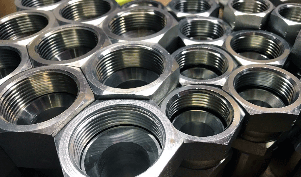 A Selection of Hydraulic Fitting in a Honeycomb patern