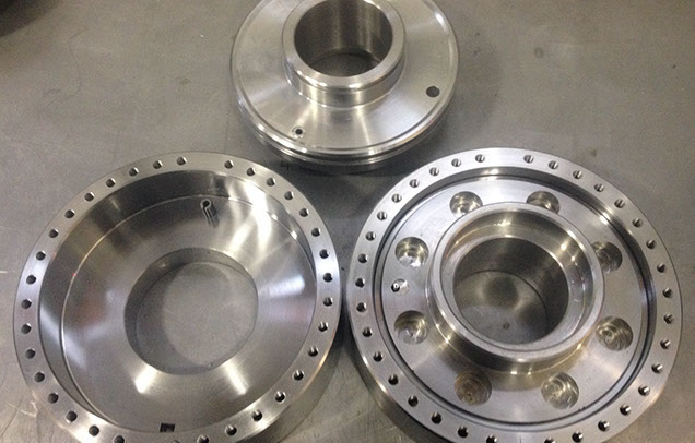 Custom made hubs Three custom made hubs to couple diffrent styles of engines and compressors